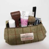 Capt Fawcett Tweed Washbag with products