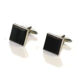 A pair of Black Square Oxhorn Cufflinks