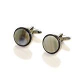 A pair of Round Oxhorn Cufflinks