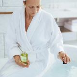Pouring Olverum into your bath