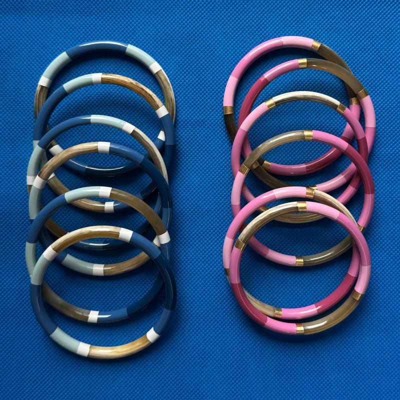 SS26-Jewellery-Blue-&-pink-horn-lacquer-bangles Blue & pink horn lacquer bangles
